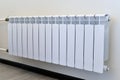 White heating radiator on the wall