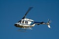 White helicopter in flight Royalty Free Stock Photo