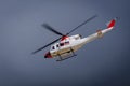 A white helicopter in flight Royalty Free Stock Photo