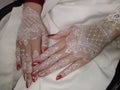 white henna combined with a white dress, elegant on the wedding day Royalty Free Stock Photo