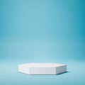 White Hexagonal Product Display Podium on Blue Background Royalty Free Stock Photo