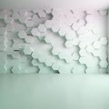 White hexagonal tiles create a 3D effect on a wall forming a geometric pattern Royalty Free Stock Photo