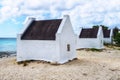 White historic slave houses on Bonaire tropical coastline