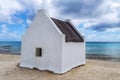 White historic slave houses on Bonaire tropical coastline