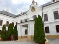 white historical building with ornaments in VeszprÃ©m