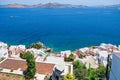 White holiday villas houses on resort with sea view and swimming pool and palm trees Royalty Free Stock Photo