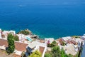 White holiday villas houses on resort with sea view and swimming pool and palm trees Royalty Free Stock Photo