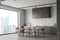 White home kitchen interior with cooking and dining area, panoramic window Royalty Free Stock Photo