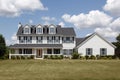 White home with large front yard