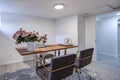 White home office with chrome and wood desk