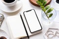 White home office tabletop with smartphone mock-up, coffee cup and notepad