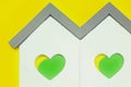 White Home Shape With Yellow Green Heart Shape Window