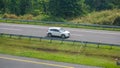 White Honda HR-V driving fast on trans jawa highway