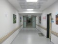 A White Hospital Corridor, Seats Around