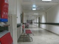 A White Hospital Corridor, Seats Around