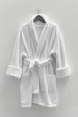 white hotel fleece bathrobe on a white background Royalty Free Stock Photo