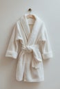 white hotel fleece bathrobe on a white background Royalty Free Stock Photo