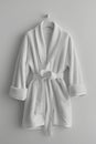 white hotel fleece bathrobe on a white background Royalty Free Stock Photo