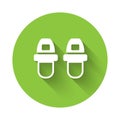 White Hotel slippers icon isolated with long shadow. Flip flops sign. Green circle button. Vector Royalty Free Stock Photo