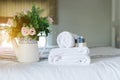 White hotel towel on bed,Stack of fluffy bath towels Royalty Free Stock Photo