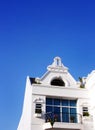 White house, blue tropical sky Royalty Free Stock Photo