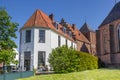 White house and historic church in Vollenhove Royalty Free Stock Photo