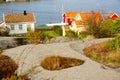 White house near fjord Kragero, Portor, Norway