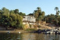 Typical white houses of a Nubian village surrounded by palm trees near Cairo Egypt and on the banks Royalty Free Stock Photo