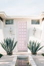 White house with a pink door, in Palm Springs, California Royalty Free Stock Photo