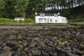 View of a white house on the Loch Hourn shores in the Isle of Skye Royalty Free Stock Photo