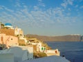 White houses, churches and blue domes in Oia village Royalty Free Stock Photo