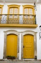 White houses with colored doors and windows in Paraty