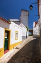 The white houses street going to the main church Igreja matriz in Mertola. Portugal