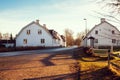 White houses at sunset, a small European village, Sweden, the neighborhood of Stockholm.