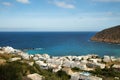 White houses and turquoies ocean in Naxos in Greece