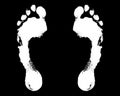 White human footprint black background isolated closeup, barefoot person foot print pattern illustration, footstep silhouette mark Royalty Free Stock Photo