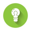 White Human head with lamp bulb icon isolated with long shadow. Green circle button. Vector Royalty Free Stock Photo
