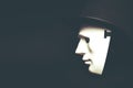 White human mask in hat Royalty Free Stock Photo