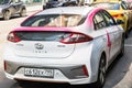 White Hyundai IONIQ hybrid at Moscow street. Hyundai brand new compact class electric eco friendly car, rear view