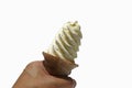 White ice cream spiral shape on the scoop in hand isolated on white background. Clipping path Royalty Free Stock Photo