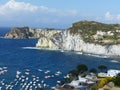 White imposing cliffs in a bay of Ponza in Italy. Royalty Free Stock Photo