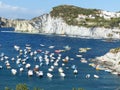 White imposing cliffs in a bay of the island of Ponza in Italy. Royalty Free Stock Photo