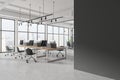 White industrial style open space office corner with coworking and glass board room, gray blank wall Royalty Free Stock Photo