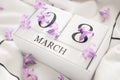 White infinite calendar on white background with 8 march date. International woman`s day