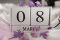 White infinite calendar on white background with 8 march date. International woman`s day