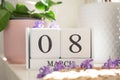 White infinite calendar on white background with 8 march date. International woman`s day