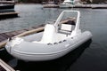 White Inflatable Rubber Speed Motor Boat At The Berth