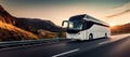 white intercity bus rides on highway, sunset, copy space Royalty Free Stock Photo