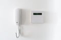 White Intercom and Digital Display on Wall