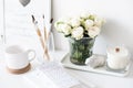 White interior decor with new hand-made candle and bouquet of fr Royalty Free Stock Photo